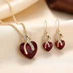 Conjunto de corações invertidos com rubis em ouro