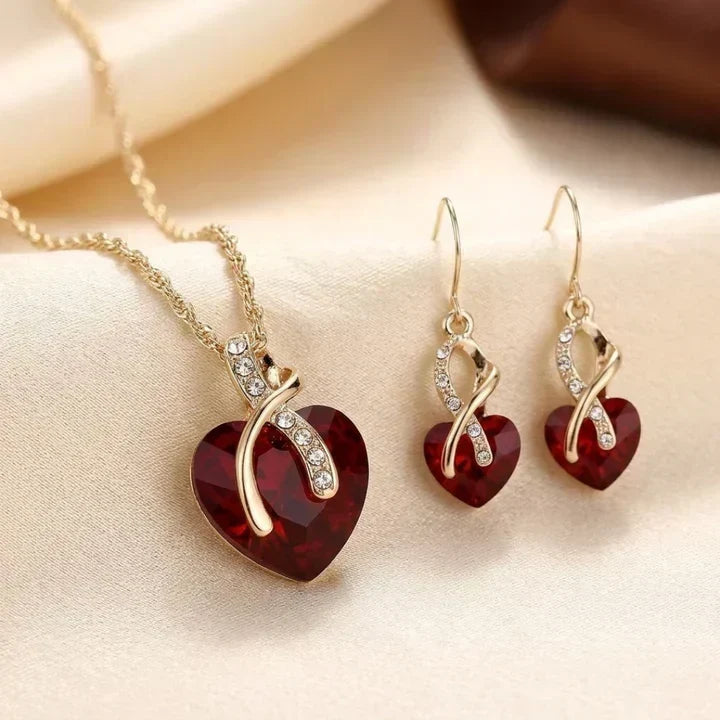 Conjunto de corações invertidos com rubis em ouro