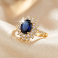 Anel Halo de Ouro com Safira